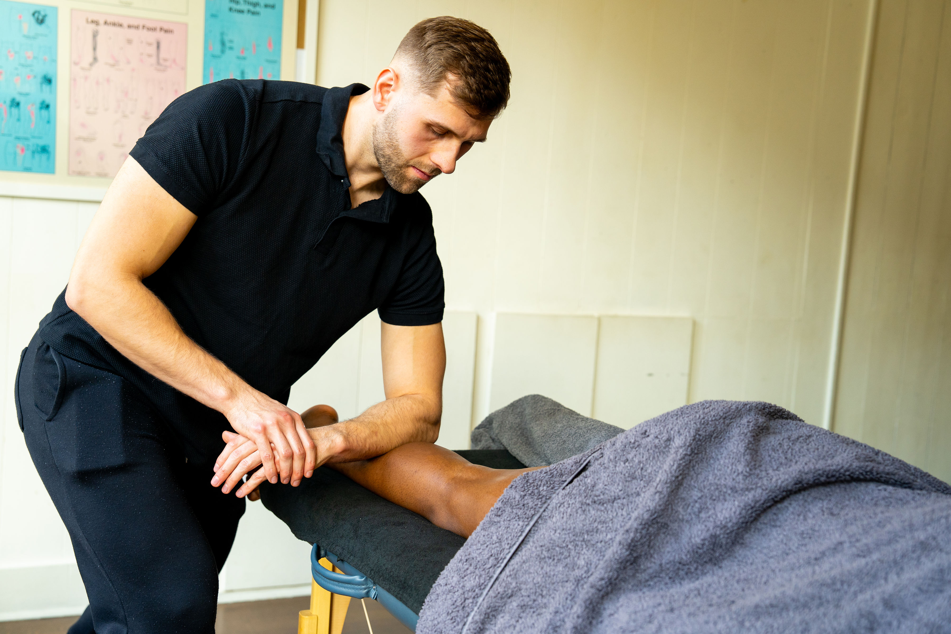 Massage Therapist performing the Sports Massage